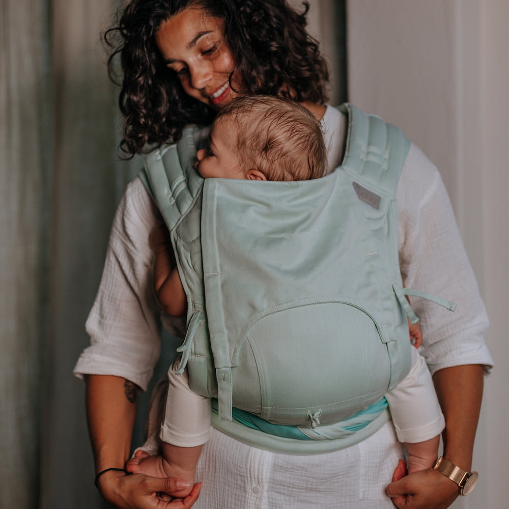Front view of Fly Tai Mei Tai Sling baby carrier Design Chevron pastel mint