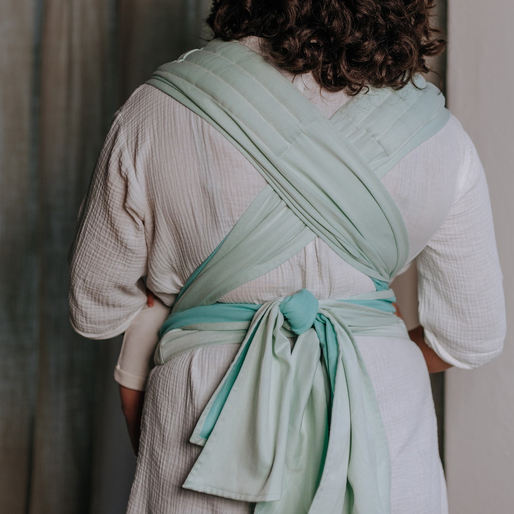 Back view of Fly Tai Mei Tai Sling baby carrier Design Chevron pastel mint