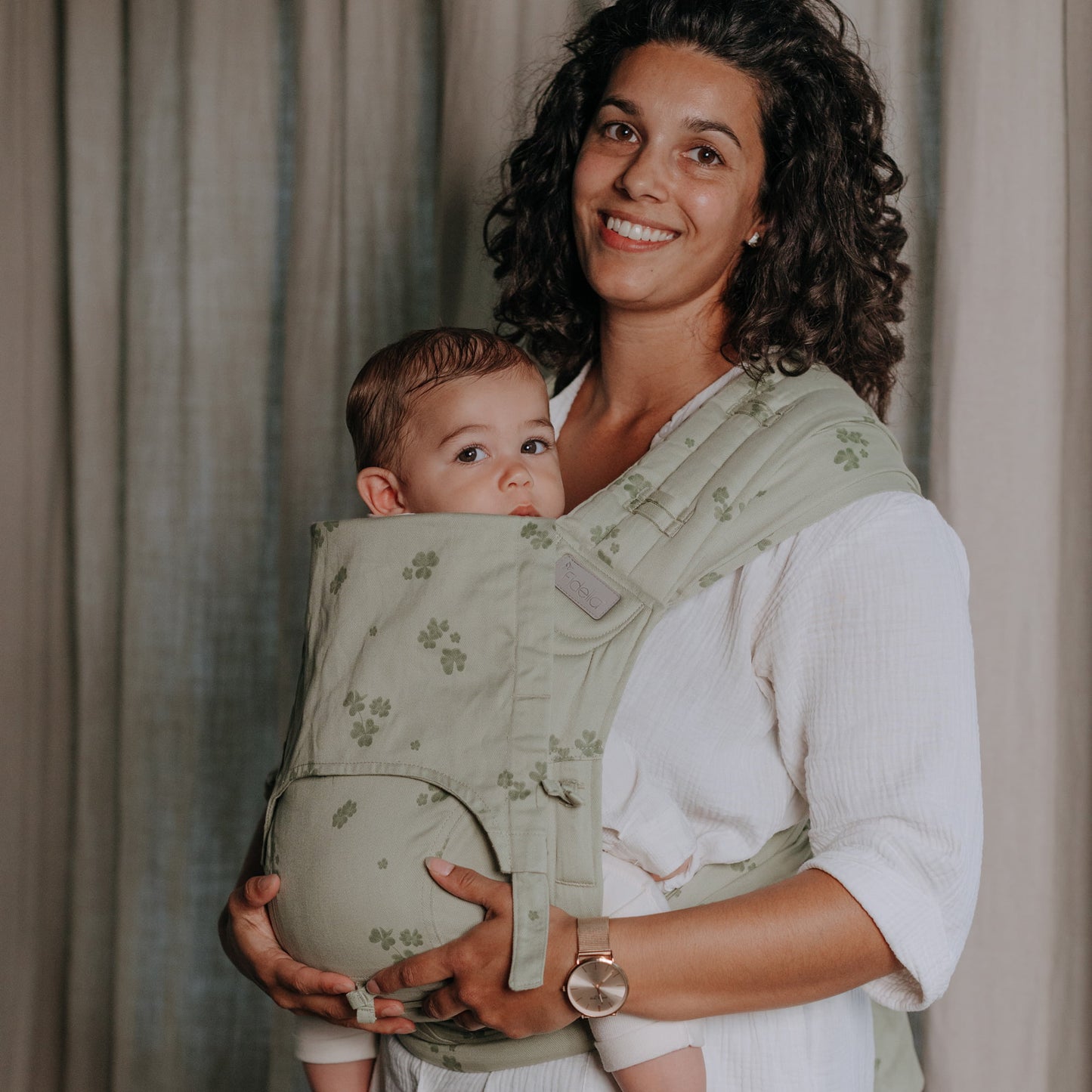 Side view of Fly Tai Mei Tai Sling baby carrier Design Clover pale green