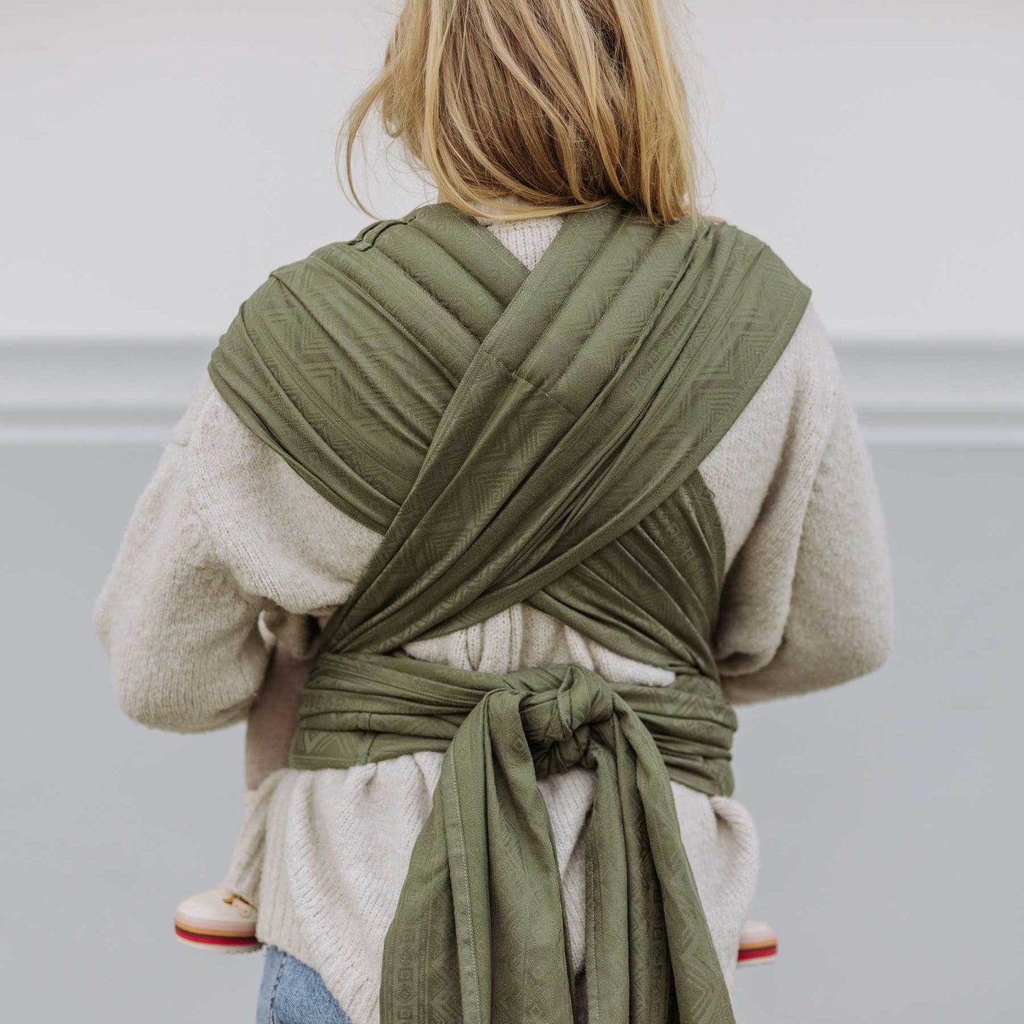 Back view of Fly Tai Mei Tai Sling baby carrier Design Cubic Lines moss