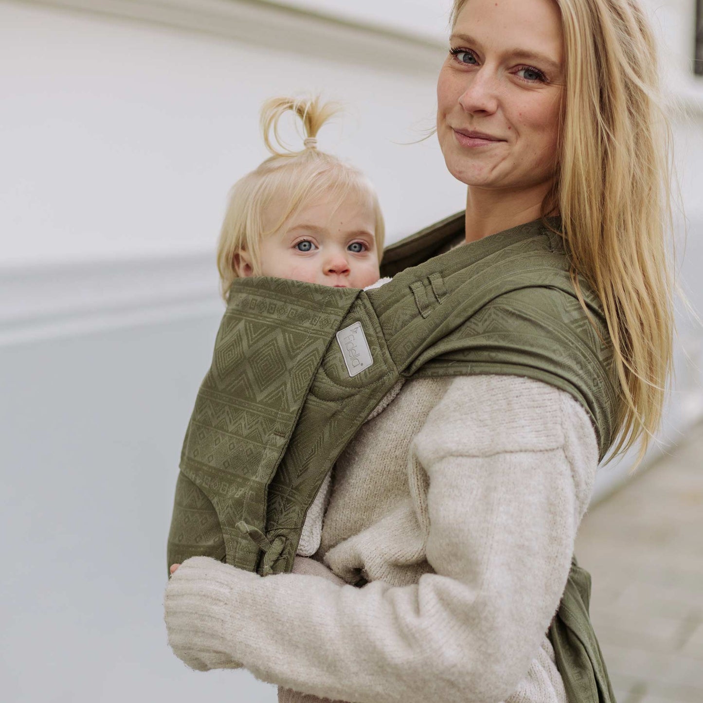 Side view of Fly Tai Mei Tai Sling baby carrier Design Cubic Lines moss