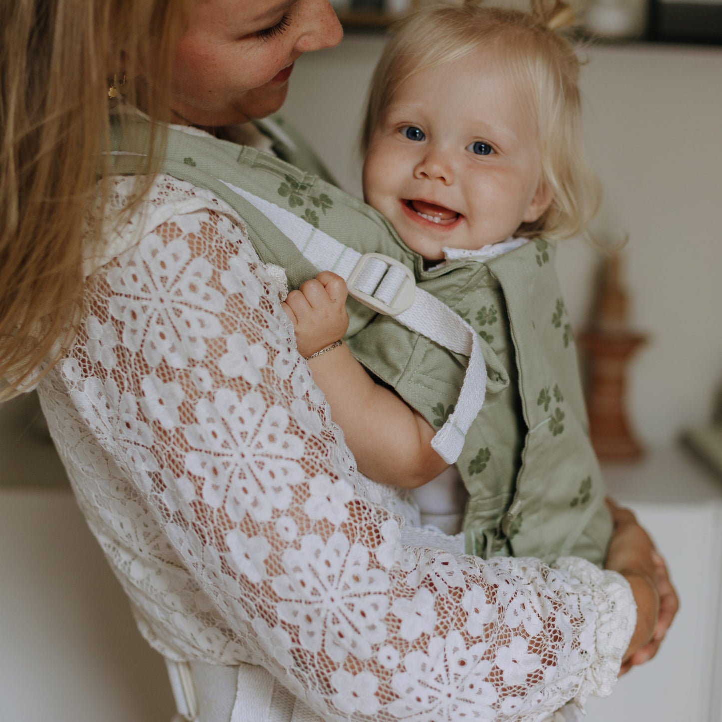 Side view of Fusion Full Buckle Baby Carrier Design Clover pale green