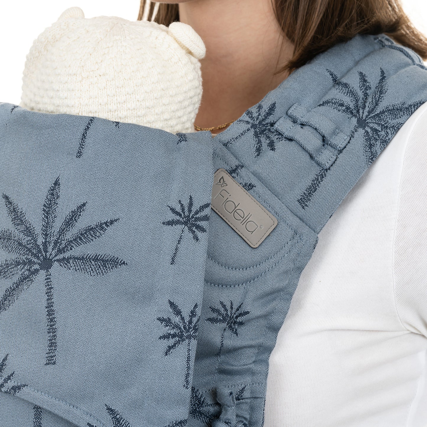 Close up of FlyClick Half Buckle Baby Carrier Design Palm Trees dove blue