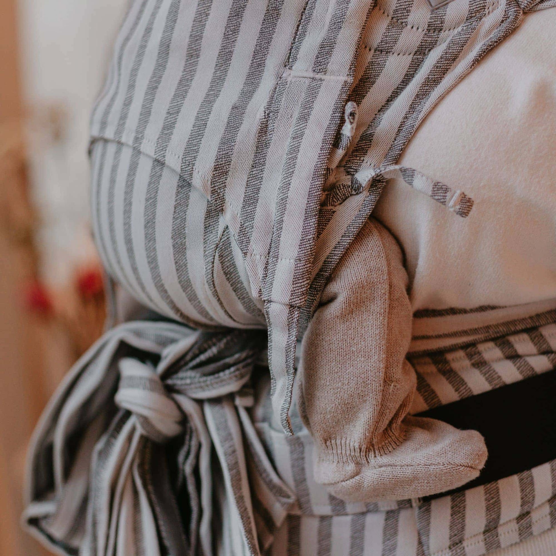 Close up of FlyClick  Half Buckle Baby Carrier Design Stripes  grey
