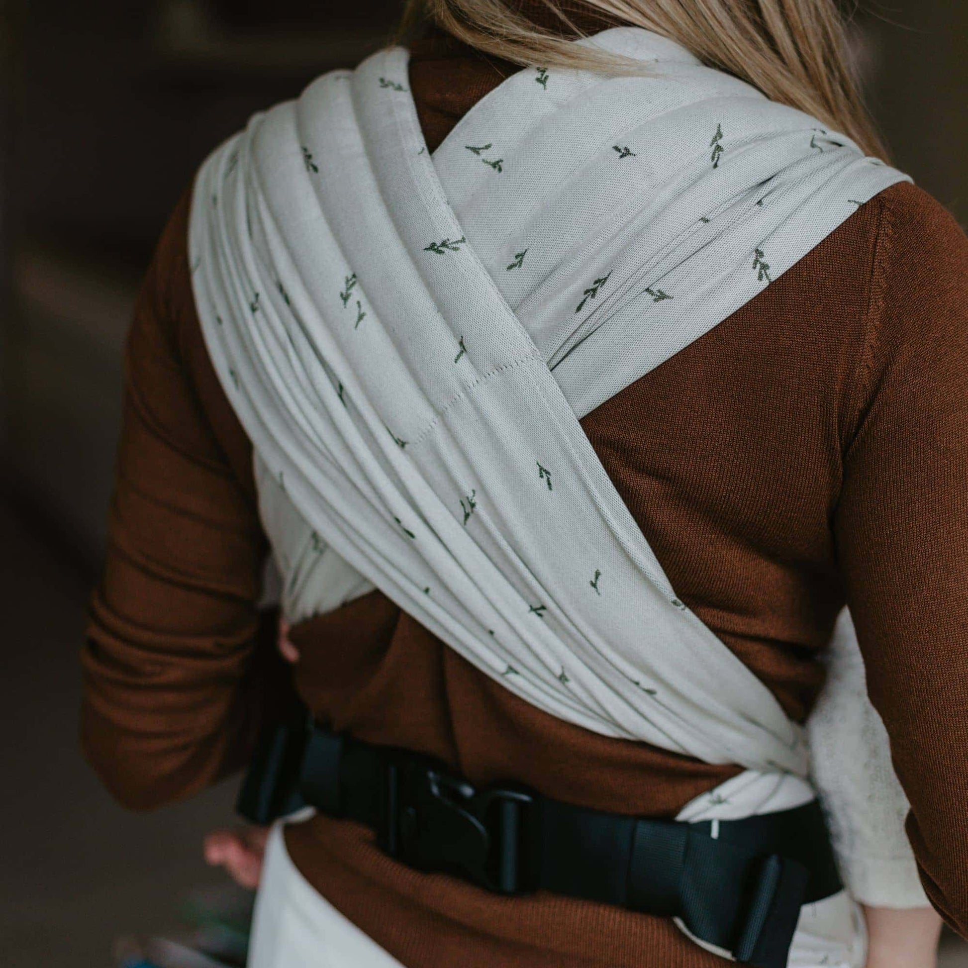 Back view of FlyClick  Half Buckle Baby Carrier Design Leaves  green