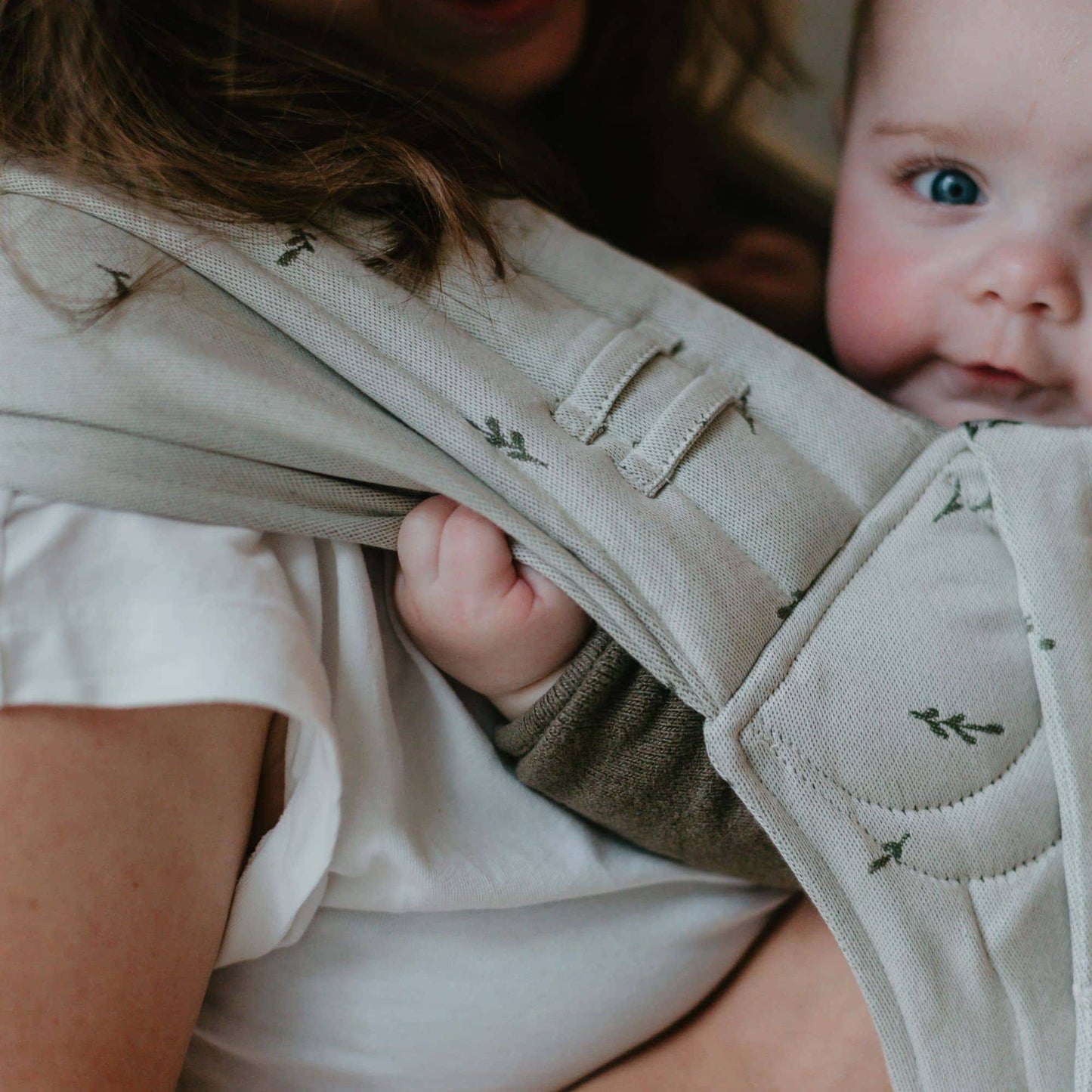 Close up of Fly Tai Mei Tai  Sling baby carrier Design Leaves  green