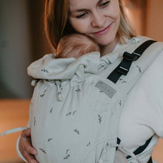 Side view of Fusion Full Buckle Baby Carrier Design Leaves  green